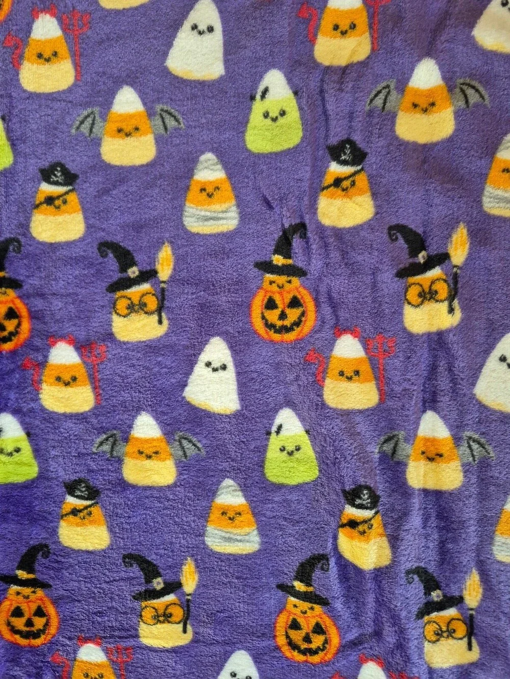 Halloween Themed Purple Fleece Blanket with Candy Corn and Pumpkin Pattern